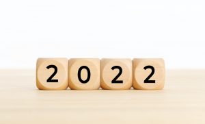 2022 displayed in wooden blocks, announcing the 2022 Medicare Premium Increases.