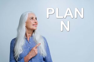 Senior woman pointing to Plan N representing Medigap Plan N