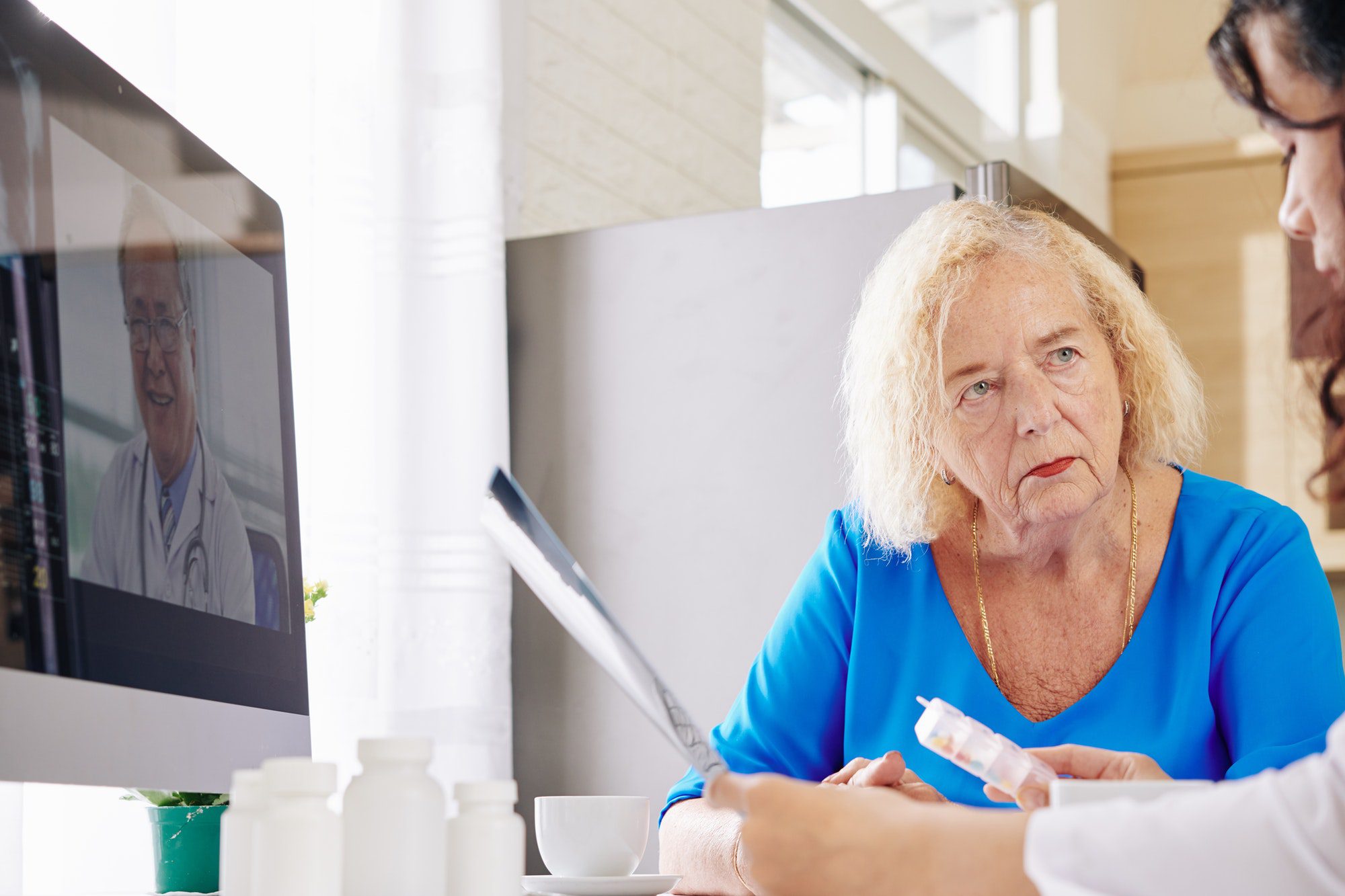 Concerned senior woman trying to understanding the underwriting process of medicare better.