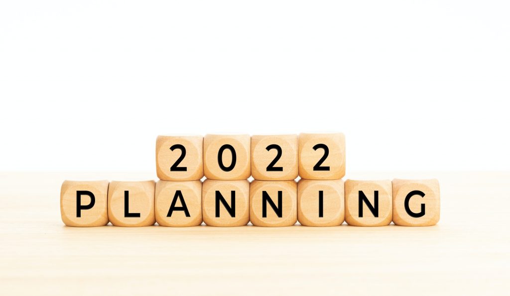 Medigap Plans are available in 2022 Planning word in wooden blocks on table