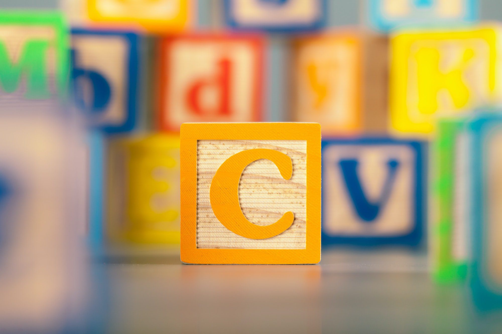 Photograph of colorful Wooden Block Letter C referring to Creditable Coverage for Medicare