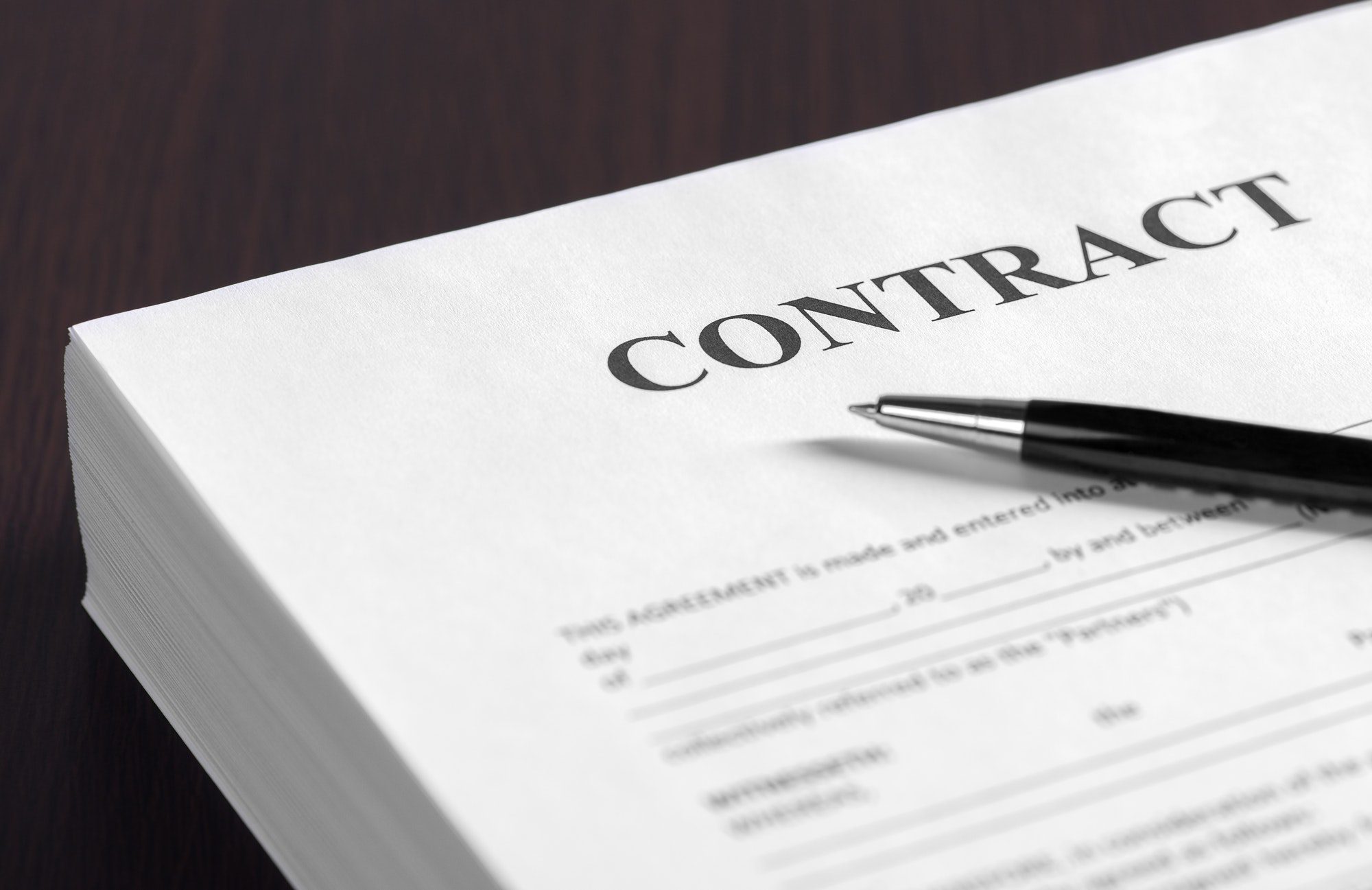 The contract on the desktop shows how a Medicare Agent gets paid.